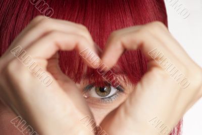 woman shows heart