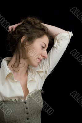 portrait of a young woman on black background