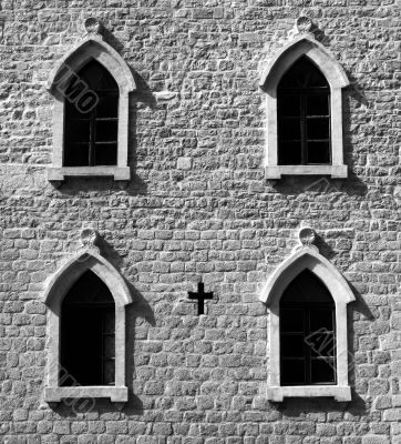 Brick wall with gothic windows