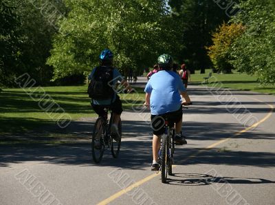 Kids on bicycles on bike path