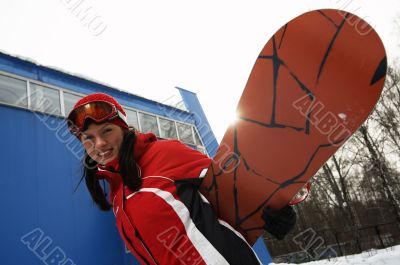 young adult female snowboarder