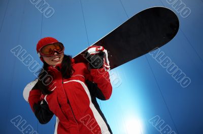 young adult female snowboarder