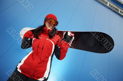 young adult female snowboarder