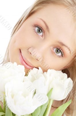 happy girl with white tulips