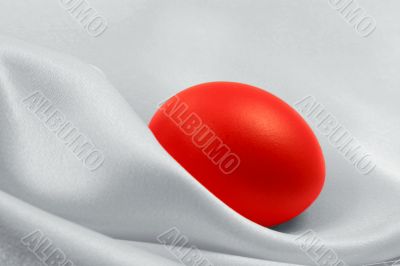 Red egg on white