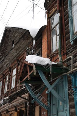 Elements of a facade of the old wooden house.