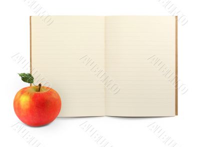 exercise book and apple