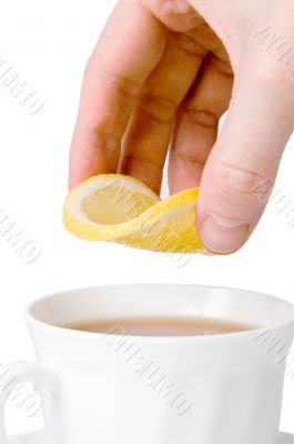 Tea cup and lemon