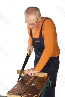 man is sawing