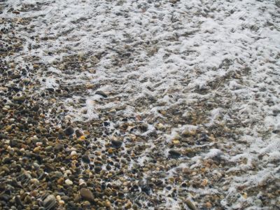 Foam on pebbles