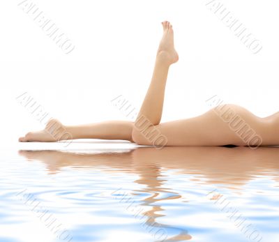 long legs of relaxed lady in water 2