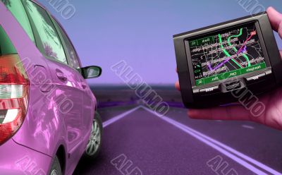 GPS Vehicle navigation system in a man hand.