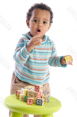 Girl playing with small pieces