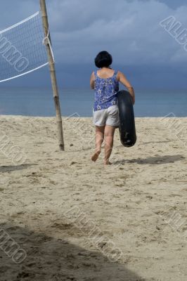 Lone woman on beach