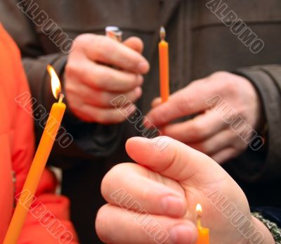 hands and candles