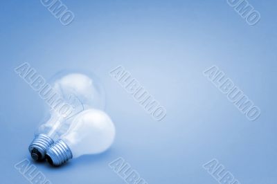 Background with lit lightbulb