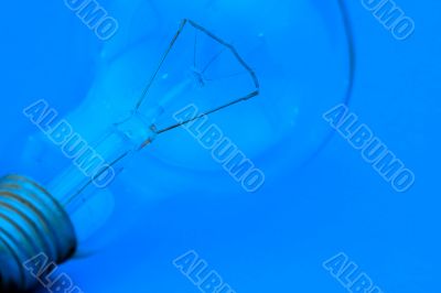 Background with lit lightbulb