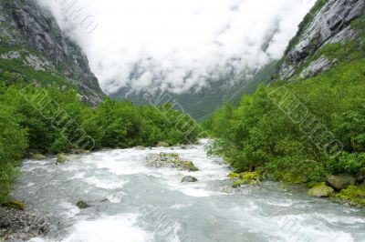 Clouds and cold river