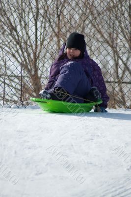 Young Girl Sliding