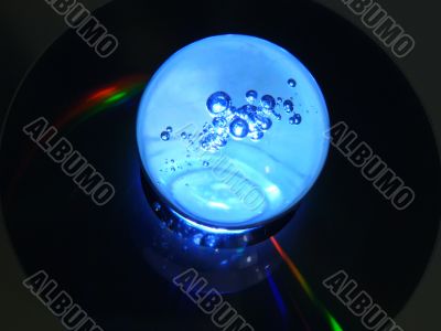 Blue sphere on a disk
