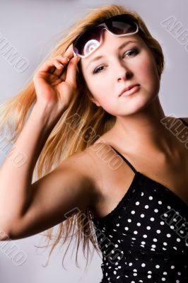 Girl with sunglasses feeling sexy