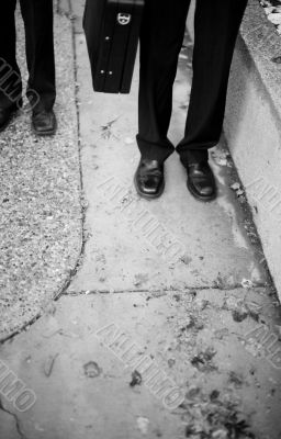 businessmen`s legs