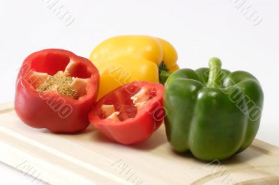 Peppers on Kitchen Board