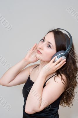 Young woman listening music