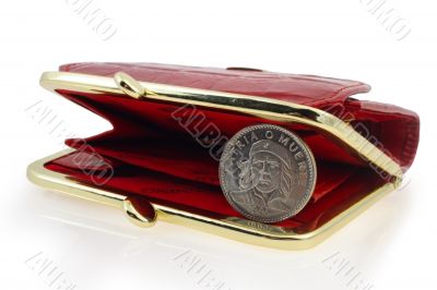 red wallet and cuban coin