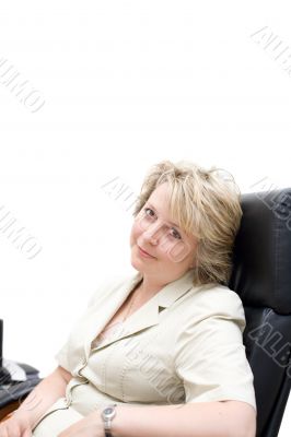 Mid-life business woman in chair