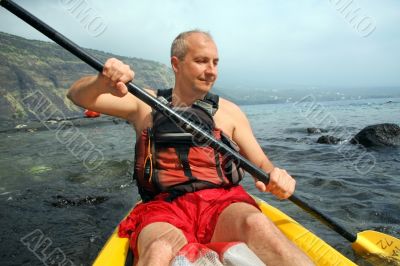 Man kayaking