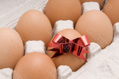 egg  with red bow