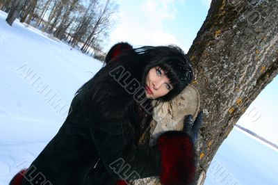woman near tree. Winter`s picture