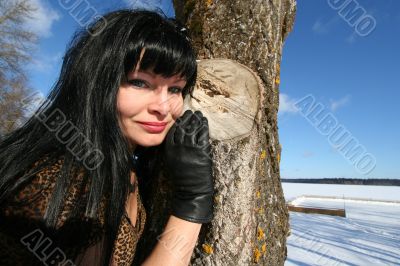 woman near tree. Winter`s picture