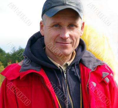 The Man in red jacket.