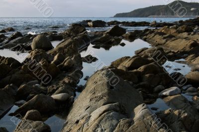 Landscape with rocks and sea