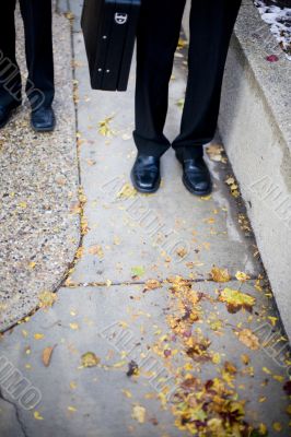 businessmen`s legs
