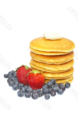 Pancakes, blueberries and strawberries