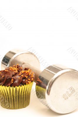 fitness weight & chocolate cupcake vertical