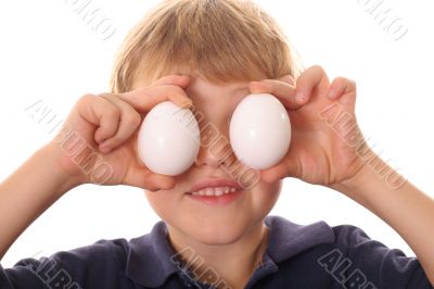 little boy with egg eyes