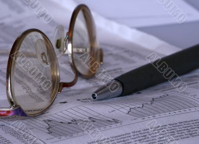 Business Magazine and glasses
