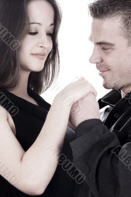 Young couple holding hands
