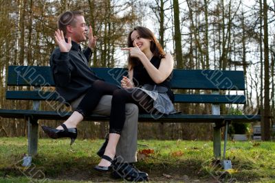 Young couple pointing