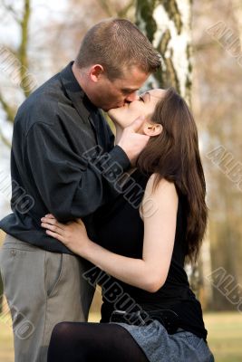 Young kissing couple