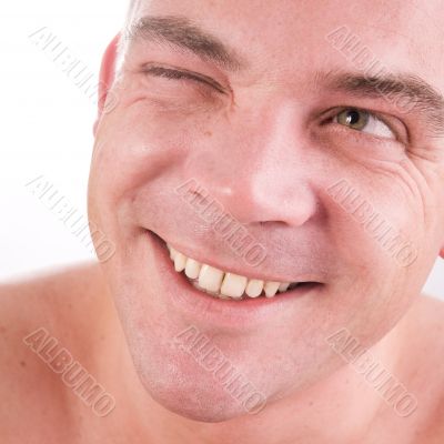 Young man blinking