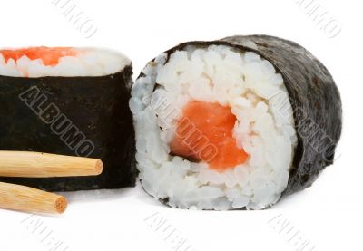 close-up of sushi and chopsticks