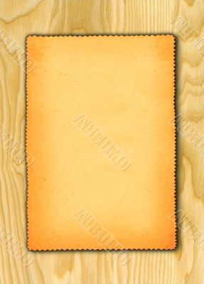 paper against wooden background