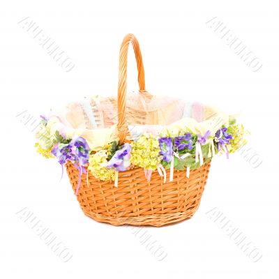 Empty basket with decoration on white