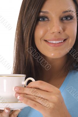 beautiful model having a cup of coffee