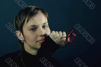 Pretty young woman with the glasses